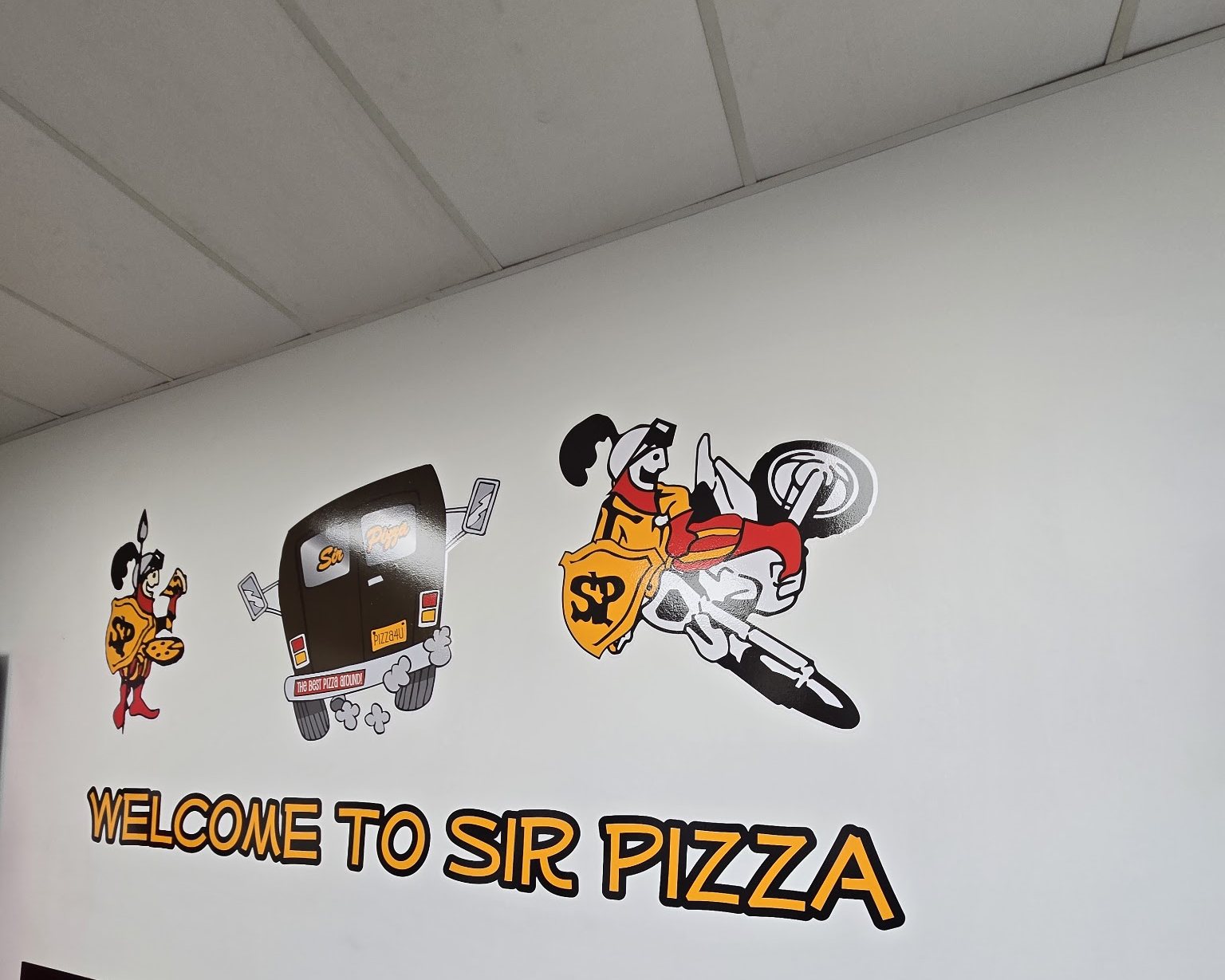 Welcome to Sir Pizza mural inside