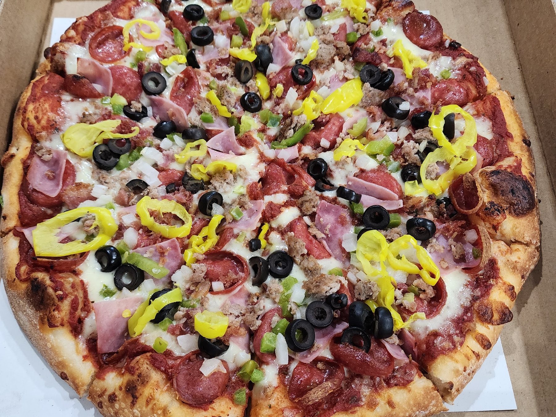 Loaded Sir Pizza with banana peppers and olives